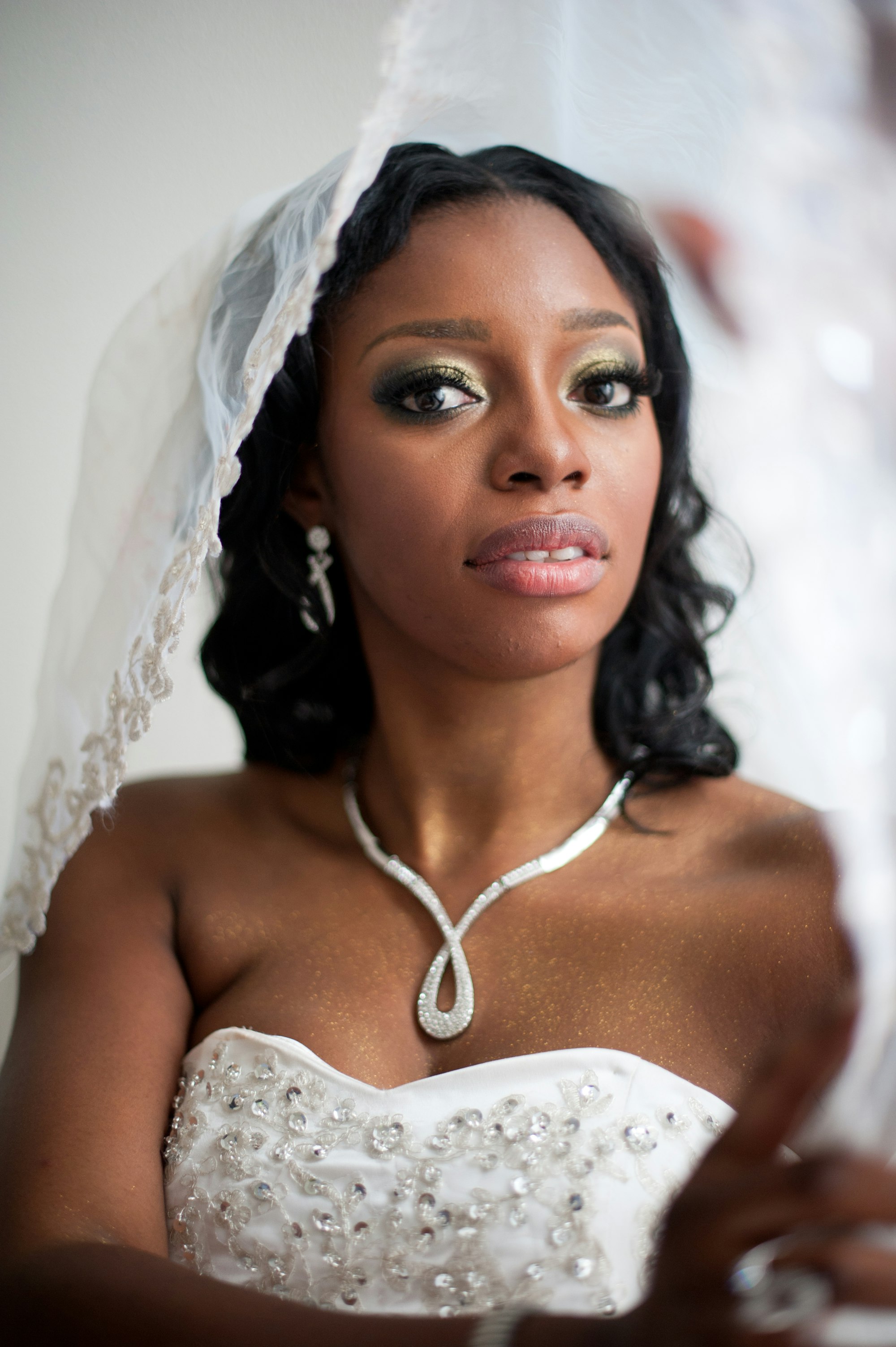 Simone in her veil and necklace