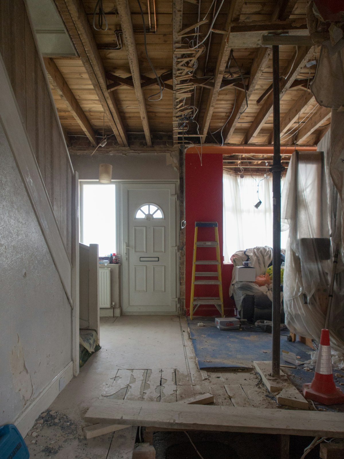 Week 4: ceiling joists open from the kitchen through to the front door