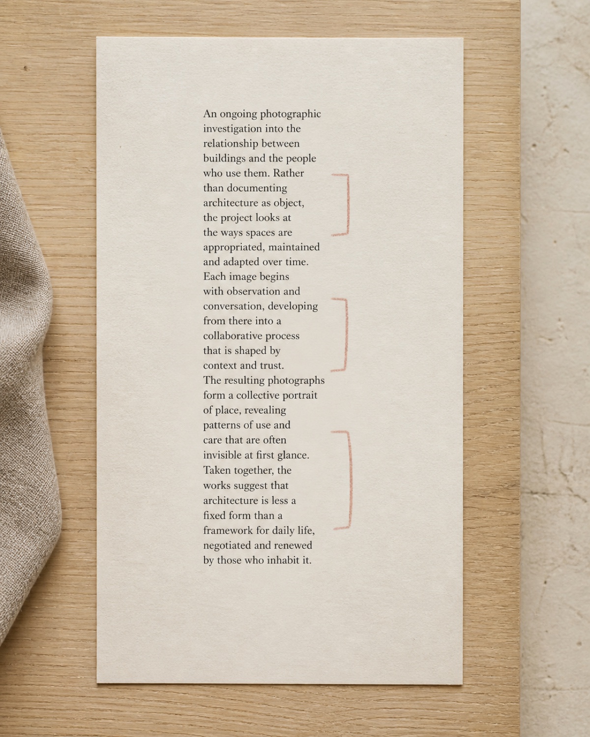 A text column set with a badly uneven rag, the deep notches in the right-hand edge marked in dusty rose pencil