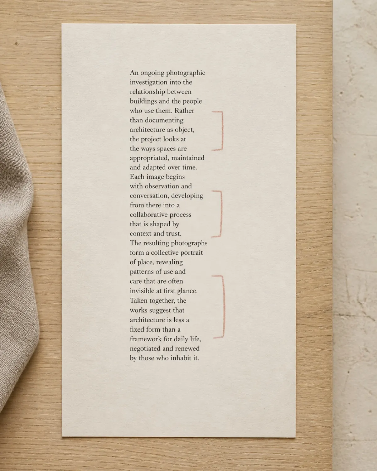 A text column set with a badly uneven rag, the deep notches in the right-hand edge marked in dusty rose pencil
