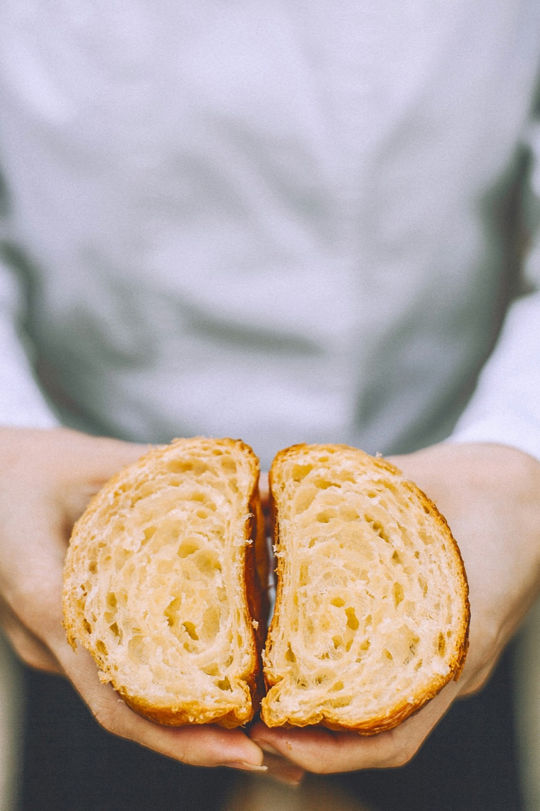 A torn brioche showing its soft inside