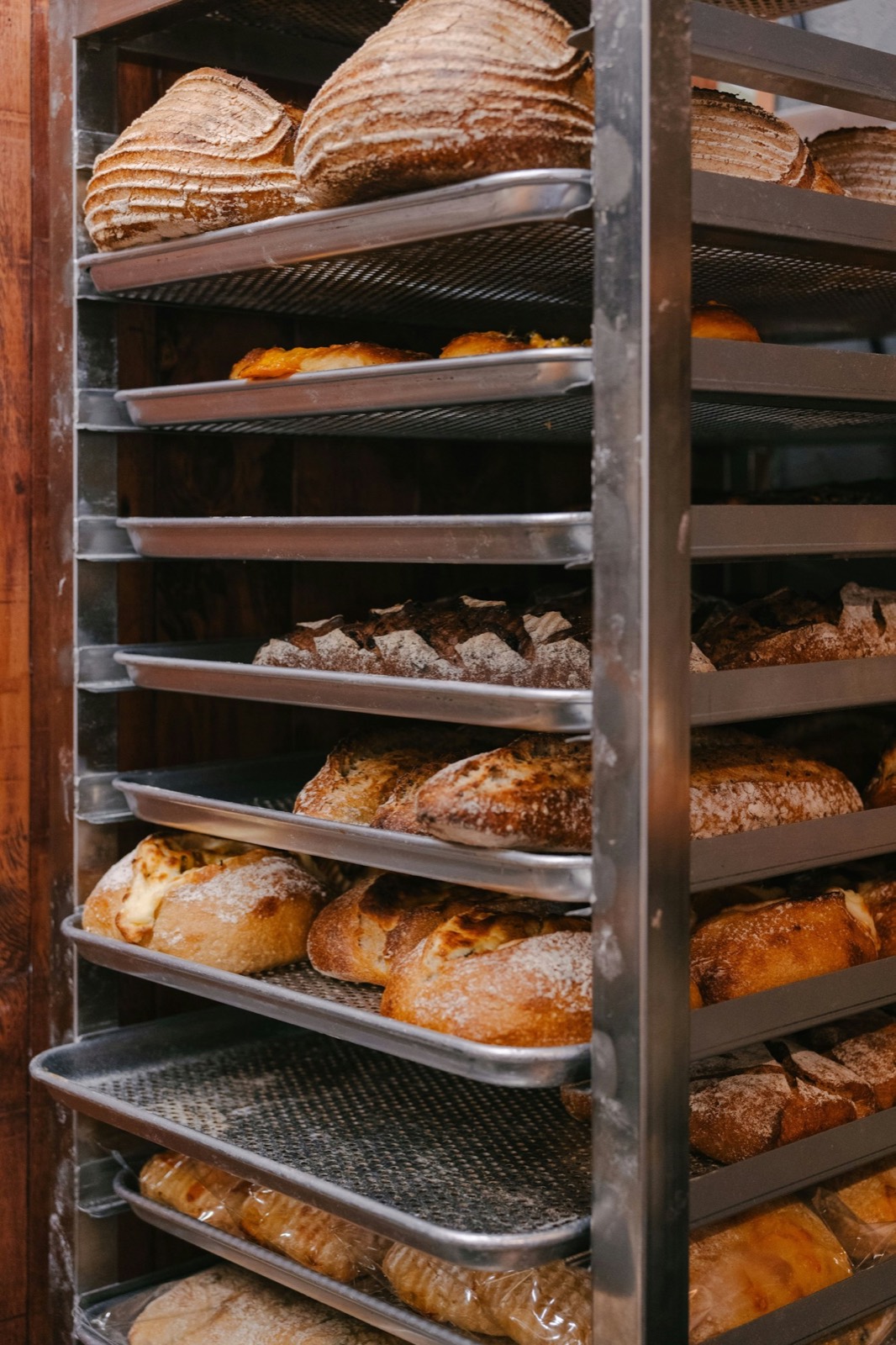A tall rack of loaves ready for delivery